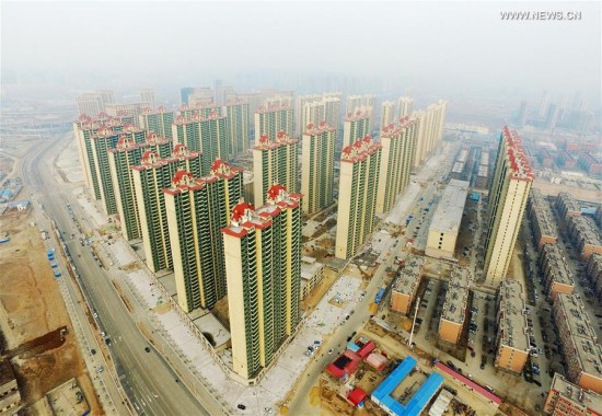Photo taken on Feb. 25, 2016 shows a cluster of residential buildings for sale in Shijiazhuang, capital of north China's Hebei Province. (Photo: Xinhua/Zhu Xudong) Photo taken on Feb. 25, 2016 shows a cluster of residential buildings for sale in Shijiazhuang, capital of north China's Hebei Province. (Photo: Xinhua/Zhu Xudong)
