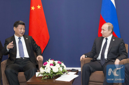 Chinese President Xi Jinping (L) meets with Russian President Vladimir Putin in Paris, France, Nov. 30, 2015. (Xinhua/Huang Jingwen) Chinese President Xi Jinping (L) meets with Russian President Vladimir Putin in Paris, France, Nov. 30, 2015. (Xinhua/Huang Jingwen)