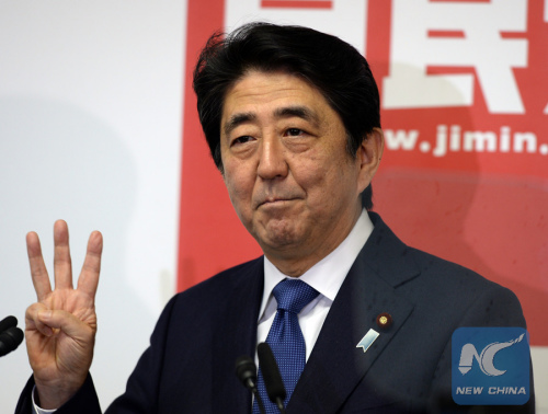 Japanese Prime Minister and ruling Liberal Democratic Party (LDP) President Shinzo Abe gestures at the LDP lawmakers meeting in Tokyo on Sept. 24, 2015. Abe remained the party's president, announced by the LDP in the meeting on Thursday. (Xinhua/Ma Ping) Japanese Prime Minister and ruling Liberal Democratic Party (LDP) President Shinzo Abe gestures at the LDP lawmakers meeting in Tokyo on Sept. 24, 2015. Abe remained the party's president, announced by the LDP in the meeting on Thursday. (Xinhua/Ma Ping)