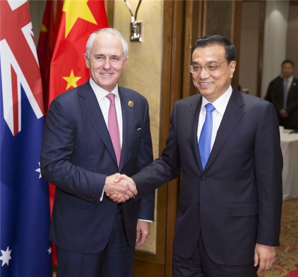 Chinese Premier Li Keqiang (right) shakes hands with Australian Prime Minister Malcolm Turnbull during their meeting on the sidelines of a series of regional summits in Kuala Lumpur, Malaysia, Nov 21, 2015. (Photo/Xinhua) Chinese Premier Li Keqiang (right) shakes hands with Australian Prime Minister Malcolm Turnbull during their meeting on the sidelines of a series of regional summits in Kuala Lumpur, Malaysia, Nov 21, 2015. (Photo/Xinhua)