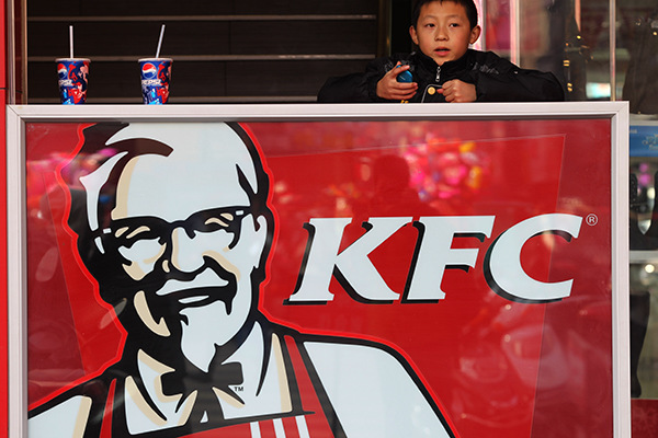 A boy plays at a KFC restaurant in Nantong, Jiangsu province. Yum Brands Inc, owner of KFC and Pizza Hut chains, gets more than half of its revenue from China. (Photo/China Daily) A boy plays at a KFC restaurant in Nantong, Jiangsu province. Yum Brands Inc, owner of KFC and Pizza Hut chains, gets more than half of its revenue from China. (Photo/China Daily)