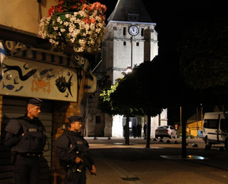 French police stand guard near the church which was attacked in Saint-Etienne-du-Rouvray, Seine-Maritime department, France, July 26, 2016. (Xinhua/Zhang Xuefei) French police stand guard near the church which was attacked in Saint-Etienne-du-Rouvray, Seine-Maritime department, France, July 26, 2016. (Xinhua/Zhang Xuefei)