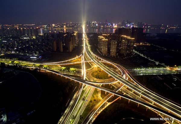 File photo taken on May 24, 2016 shows an aerial view of expressways linking Hangzhou Xiaoshan International Airport at night in Hangzhou, East China's Zhejiang province. Hangzhou is the host city for the 2016 G20 summit on Sept 4 and Sept 5. With one month to go, Hangzhou looks forward to G20. (Photo/Xinhua) File photo taken on May 24, 2016 shows an aerial view of expressways linking Hangzhou Xiaoshan International Airport at night in Hangzhou, East China's Zhejiang province. Hangzhou is the host city for the 2016 G20 summit on Sept 4 and Sept 5. With one month to go, Hangzhou looks forward to G20. (Photo/Xinhua)