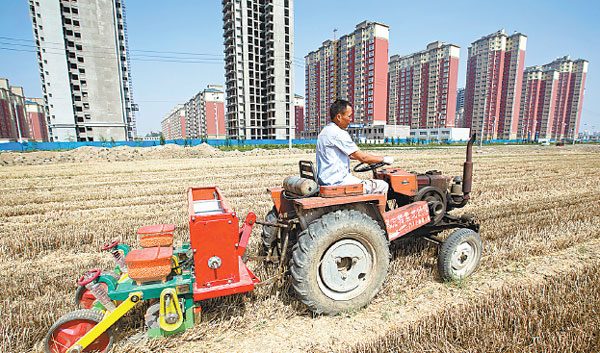 New buildings in Huaxian county, Henan province. Urbanization will play an active role in keeping the country's investment and rowth stable. Wang Zirui / For China Daily New buildings in Huaxian county, Henan province. Urbanization will play an active role in keeping the country's investment and rowth stable. Wang Zirui / For China Daily