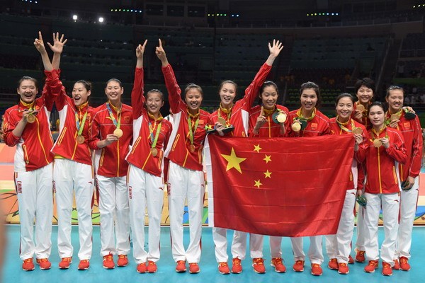 Chinese players pose with their gold medals after claiming the title in the women's volleyball final. (Photo by Wei Xiaohao/chinadaily.com.cn) Chinese players pose with their gold medals after claiming the title in the women's volleyball final. (Photo by Wei Xiaohao/chinadaily.com.cn)