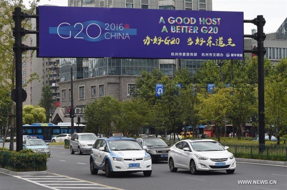 Cars move on a street in Hangzhou, capital of east China's Zhejiang Province, Aug. 27, 2016. The 11th G20 summit will be held from Sept. 4 to 5 in Hangzhou. (Photo: Xinhua/Ju Huanzong) Cars move on a street in Hangzhou, capital of east China's Zhejiang Province, Aug. 27, 2016. The 11th G20 summit will be held from Sept. 4 to 5 in Hangzhou. (Photo: Xinhua/Ju Huanzong)