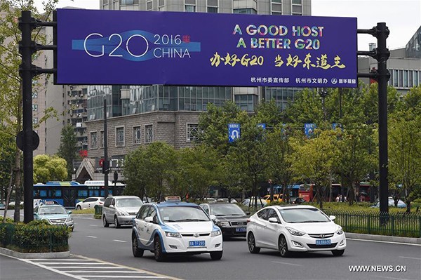 Cars move on a street in Hangzhou, capital of East China's Zhejiang province, Aug 27, 2016. The 11th G20 summit will be held from Sept 4 to 5 in Hangzhou. (Photo/Xinhua) Cars move on a street in Hangzhou, capital of East China's Zhejiang province, Aug 27, 2016. The 11th G20 summit will be held from Sept 4 to 5 in Hangzhou. (Photo/Xinhua)
