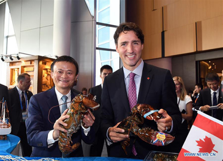 Canadian Prime Minister Justin Trudeau and Alibaba's chairman Jack Ma show lobsters from Canada at the headquarters of Alibaba Group in Hangzhou, capital of East China's Zhejiang province, September 3, 2016. (Photo/Xinhua) Canadian Prime Minister Justin Trudeau and Alibaba's chairman Jack Ma show lobsters from Canada at the headquarters of Alibaba Group in Hangzhou, capital of East China's Zhejiang province, September 3, 2016. (Photo/Xinhua)