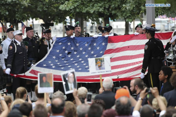 A national flag of the United Staes is displayed at a ceremony marking the 15th anniversary of September 11 attacks at the National 9/11 Memorial, in New York, the United States, on Sept. 11, 2016. (Photo: Xinhua/Wang Ying) A national flag of the United Staes is displayed at a ceremony marking the 15th anniversary of September 11 attacks at the National 9/11 Memorial, in New York, the United States, on Sept. 11, 2016. (Photo: Xinhua/Wang Ying)