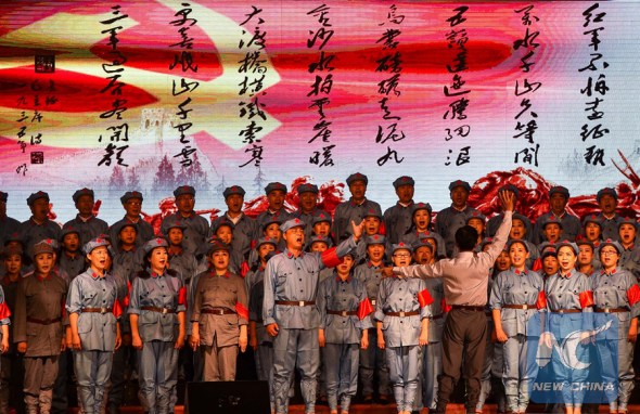 Performers sing the song Long March in chorus during a song and dance performance commemorating the 80th anniversary of the end of Red Army's Long March, a 12,500-km forced expedition that made history,in Jilin, northeast China's Jilin Province, Aug. 24, 2016. (Photo: Xinhua/Xu Chang) Performers sing the song Long March in chorus during a song and dance performance commemorating the 80th anniversary of the end of Red Army's Long March, a 12,500-km forced expedition that made history,in Jilin, northeast China's Jilin Province, Aug. 24, 2016. (Photo: Xinhua/Xu Chang)