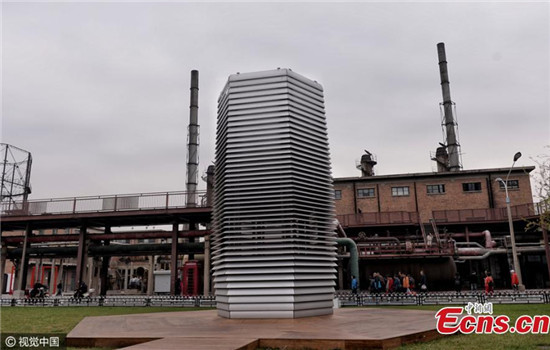 A Smog Free Tower by Dutch designer Daan Roosegaarde undergoes tests in Beijing, Oct. 20, 2016. The seven-meter-high metal structure is said to be the world's largest air purifier with the capacity to scrub 30,000 cubic meters of air an hour. (Photo/CFP) A Smog Free Tower by Dutch designer Daan Roosegaarde undergoes tests in Beijing, Oct. 20, 2016. The seven-meter-high metal structure is said to be the world's largest air purifier with the capacity to scrub 30,000 cubic meters of air an hour. (Photo/CFP)