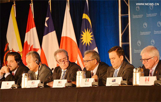 Trade ministers of the United States and 11 other Pacific Rim countries attend a press conference after negotiating the Trans-Pacific Partnership (TPP) trade agreement in Atlanta, the United States, on Oct. 5, 2015. (Photo/Xinhua) Trade ministers of the United States and 11 other Pacific Rim countries attend a press conference after negotiating the Trans-Pacific Partnership (TPP) trade agreement in Atlanta, the United States, on Oct. 5, 2015. (Photo/Xinhua)