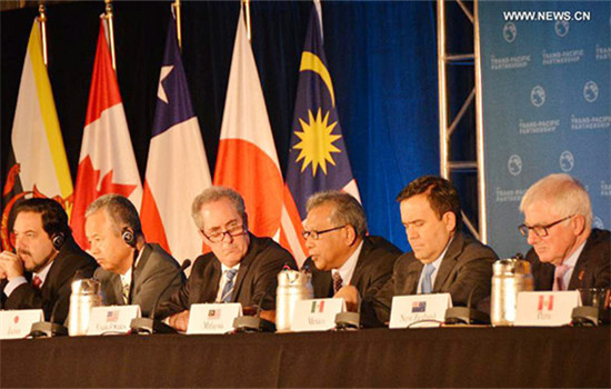 Trade ministers of the United States and 11 other Pacific Rim countries attend a press conference after negotiating the Trans-Pacific Partnership (TPP) trade agreement in Atlanta, the United States, on Oct. 5, 2015. (Photo/Xinhua) Trade ministers of the United States and 11 other Pacific Rim countries attend a press conference after negotiating the Trans-Pacific Partnership (TPP) trade agreement in Atlanta, the United States, on Oct. 5, 2015. (Photo/Xinhua)