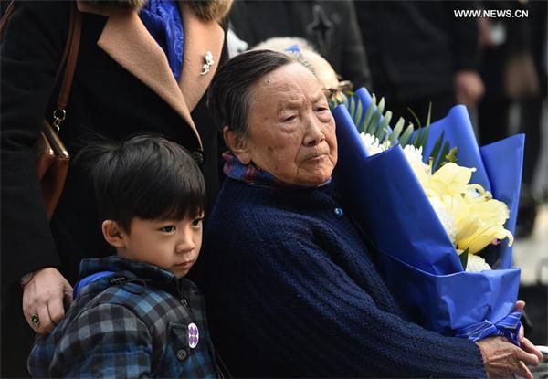 Xia Shuqin (R), a survivor of the Nanjing Massacre, and her family members mourn the victims at the Memorial Hall of the Victims in Nanjing Massacre by Japanese Invaders in Nanjing, capital of East China's Jiangsu province, Dec 3, 2016. (Photo/Xinhua) Xia Shuqin (R), a survivor of the Nanjing Massacre, and her family members mourn the victims at the Memorial Hall of the Victims in Nanjing Massacre by Japanese Invaders in Nanjing, capital of East China's Jiangsu province, Dec 3, 2016. (Photo/Xinhua)