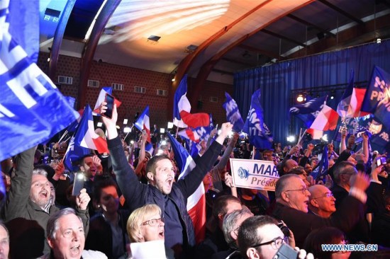 Marine Le Pen's supporters celebrate at a rally in Henin-Beaumont, France on April 23, 2017. (Xinhua/Chen Yichen) Marine Le Pen's supporters celebrate at a rally in Henin-Beaumont, France on April 23, 2017. (Xinhua/Chen Yichen)
