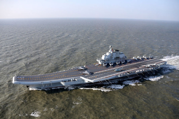 Chinese aircraft carrier Liaoning returns to Qingdao, China after Pacific drill, January 13th, 2017. Comprised of aircraft carrier Liaoning, a number of destroyers, some J-15 carrier-based fighter jets and helicopters, the fleet sailed through the Bohai Sea, the Yellow Sea, the East China Sea and the South China sea. (Photo/CRI) Chinese aircraft carrier Liaoning returns to Qingdao, China after Pacific drill, January 13th, 2017. Comprised of aircraft carrier Liaoning, a number of destroyers, some J-15 carrier-based fighter jets and helicopters, the fleet sailed through the Bohai Sea, the Yellow Sea, the East China Sea and the South China sea. (Photo/CRI)