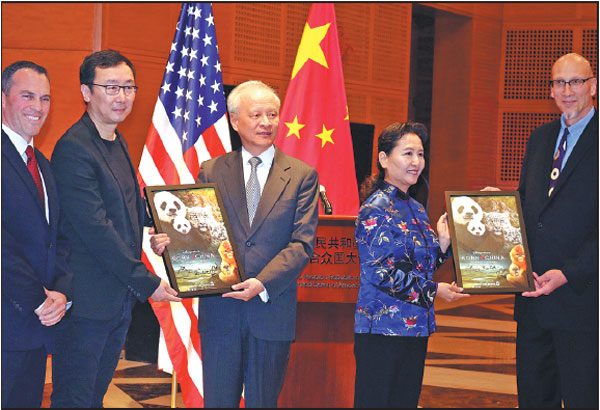 Cui Tiankai, ambassador to the U.S. (center), Walt Disney Studios Vice-President Paul Baribault (left) and Chinese documentary director Lu Chuan (second from the left) display a poster for Born in China, a Chinese-American coproduction that takes viewers on an epic journey into the wilds of the country. The film was released in the United States over the weekend. Zhao Huanxin / China Daily Cui Tiankai, ambassador to the U.S. (center), Walt Disney Studios Vice-President Paul Baribault (left) and Chinese documentary director Lu Chuan (second from the left) display a poster for Born in China, a Chinese-American coproduction that takes viewers on an epic journey into the wilds of the country. The film was released in the United States over the weekend. Zhao Huanxin / China Daily