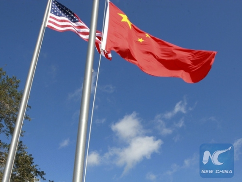 File photo: The Chinese and American flags are being raised at the Chinese Civic Center in Houston, the United States, on Sept. 25, 2011. (Xinhua/Song Qiong) File photo: The Chinese and American flags are being raised at the Chinese Civic Center in Houston, the United States, on Sept. 25, 2011. (Xinhua/Song Qiong)