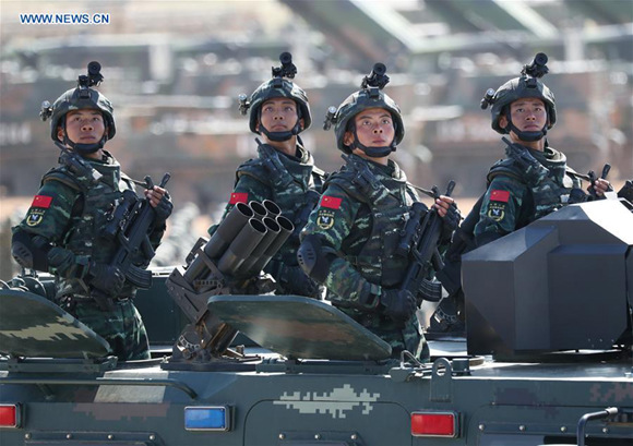 Photo taken on July 30, 2017 shows a formation of special police of the armed police force during a military parade at Zhurihe training base in north China's Inner Mongolia Autonomous Region. China on Sunday held a grand military parade to mark the 90th founding anniversary of the People's Liberation Army. (Xinhua/Pang Xinglei) Photo taken on July 30, 2017 shows a formation of special police of the armed police force during a military parade at Zhurihe training base in north China's Inner Mongolia Autonomous Region. China on Sunday held a grand military parade to mark the 90th founding anniversary of the People's Liberation Army. (Xinhua/Pang Xinglei)