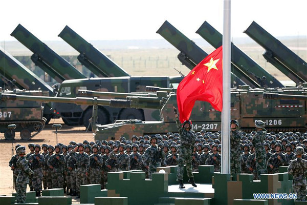 The flag raising ceremony during the military parade at Zhurihe training base in North China's Inner Mongolia autonomous region Sunday, July 30, 2017. (Photo/Xinhua) The flag raising ceremony during the military parade at Zhurihe training base in North China's Inner Mongolia autonomous region Sunday, July 30, 2017. (Photo/Xinhua)
