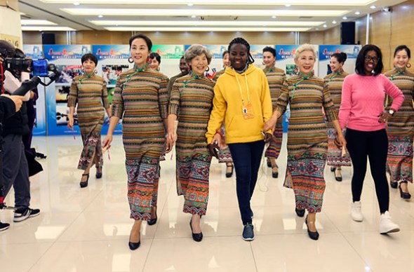 Overseas journalists in China to report about the 19th National Congress of the Communist Party of China join a modeling performance team on Saturday at the Chaoyang Elder Care Service Guidance Center, in Beijing's Chaoyang district, during a visit. The amateur models are all residents from nearby neighborhoods and are more than 60 years old. (WANG ZHUANGFEI/CHINA DAILY) Overseas journalists in China to report about the 19th National Congress of the Communist Party of China join a modeling performance team on Saturday at the Chaoyang Elder Care Service Guidance Center, in Beijing's Chaoyang district, during a visit. The amateur models are all residents from nearby neighborhoods and are more than 60 years old. (WANG ZHUANGFEI/CHINA DAILY)